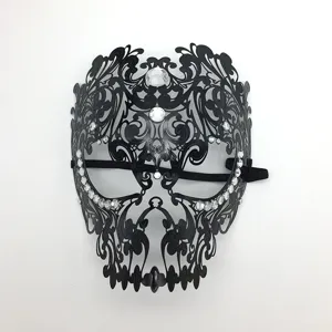 Detail view of black metal rhinestone skull mask for Halloween cosplay party masquerade