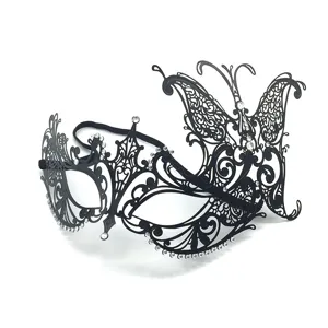 Detailed close-up shot of the black hollow metal rhinestone masquerade mask texture.
