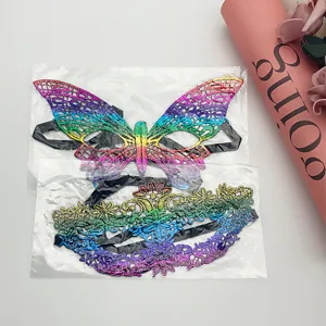 Detailed close-up of colorful lace masquerade masks, butterfly and crown styles for party.