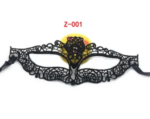 Detailed shot of black lace masquerade half-face mask for party, Halloween and events.