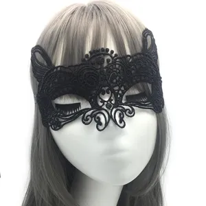 Black lace masquerade mask detail, exquisite cat ear design for party and Halloween events.