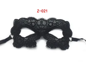 Black lace masquerade mask detail view, ideal for Halloween parties, dress up and events.