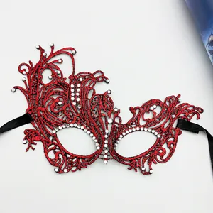 Red lace masquerade mask with rhinestones and ribbons for party costume events and Halloween.