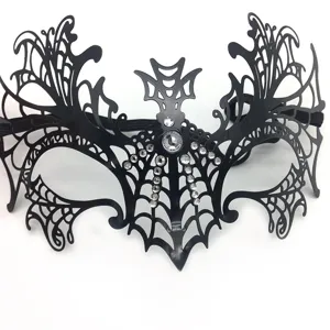 Close up view of black hollow out bat masquerade mask with sparkling rhinestones for party.