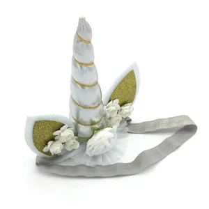 Unicorn headband for kids birthday party, cute baby hair band with golden horn and flowers.