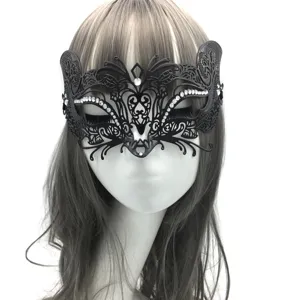 Close-up detail of the black metal rhinestone half-face masquerade mask for party cosplay events.