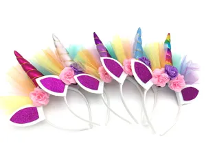 Colorful unicorn headband with mesh and flowers, perfect for birthday party and dress up.