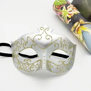 Silver masquerade mask with gold glitter details for Halloween costume party props.