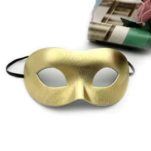 Gold masquerade half face mask closeup, party eye mask detail view with elastic band.