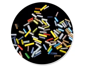 Close-up of colorful silver-lined glass bugle beads, perfect for DIY jewelry and crafts.