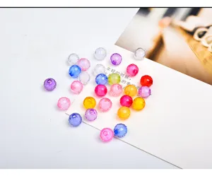 Colorful faceted acrylic beads detail view, perfect for handmade DIY crafts and jewelry making.