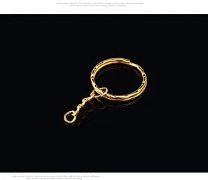 Gold-plated keychain ring detail view, featuring durable metal and extension chain for DIY crafts.
