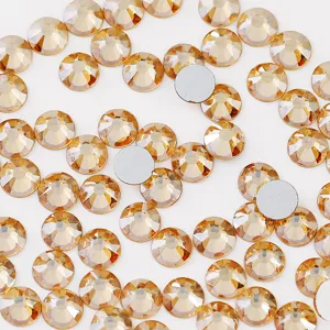 Close-up detail view of rose gold flatback crystal rhinestones, multi-faceted sparkle.