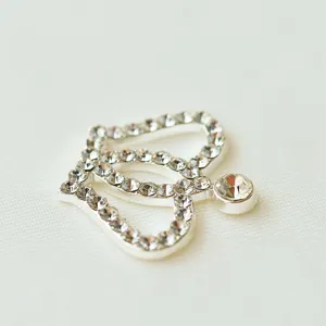 Silver rhinestone crown hair accessory sparkling crystal heart decorative charm for DIY crafts.
