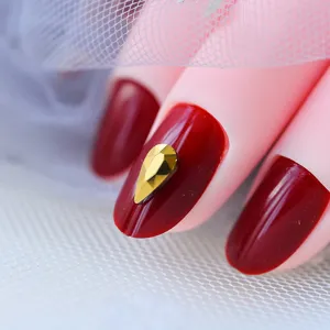 Deslumbrantes pedrería dorada en gota para uñas, gemas de vidrio planas y brillantes para manicure.