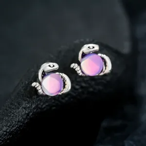 Stylish snake ear clips with pink gemstone, magnetic non-pierced design for men and women.