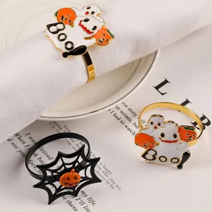 Halloween ghost pumpkin metal napkin rings close up detail, decorative table setting decor.
