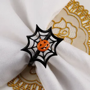 Halloween spider web napkin ring with cute orange pumpkin head, perfect for party table decor.