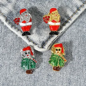 Close-up detail of Christmas themed alloy enamel brooch pins featuring Santa and tree designs.