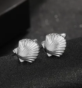 Elegant silver shell cufflinks for men, perfect for business and casual wear suits.
