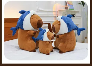 Adorable capybara plush toy featuring a fun shark hat design, soft doll for kids gift.