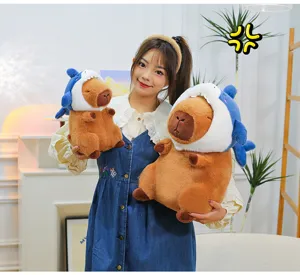 Cute capybara plush toy wearing a funny shark hat soft stuffed animal doll gift for kids.