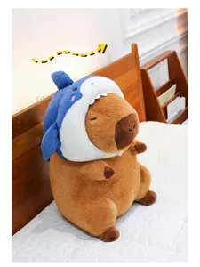 Capybara plush toy wearing cute shark hat detail view, soft stuffed animal doll gift for kids.