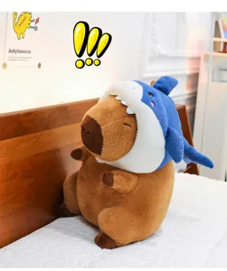 Cute capybara plush toy with shark hat soft stuffed animal doll gift for kids.