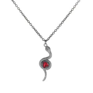 Gothic snake necklace with red heart gemstone, vintage silver tone pendant for women main view.