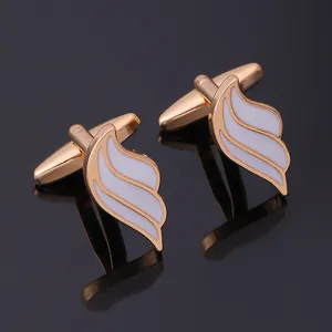 Rose gold wing cufflinks for men, elegant white enamel french shirt cuff buttons.