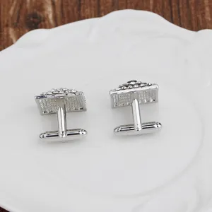 Silver-toned square rhinestone cufflinks for men, elegant French shirt accessory detail.
