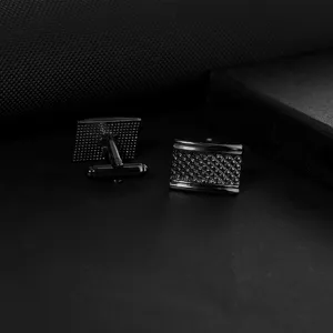 Premium black square cufflinks for men, featuring a textured geometric pattern for business attire.