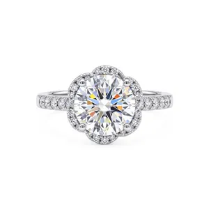 Close-up of 925 silver 1ct moissanite six-petal flower ring with sparkling pavé band.