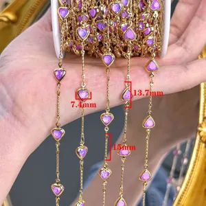 Detailed close-up of DIY golden heart chain with purple crystals, high color retention.