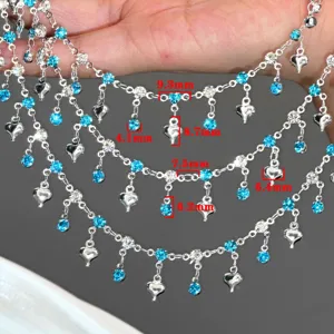 DIY multi-layer chain with blue rhinestones and heart pendants for jewelry making.