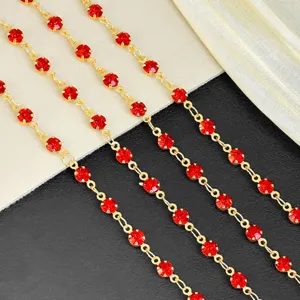 Detailed view of 4mm red rhinestone gold decorative chain, perfect for DIY crafts and accessories.