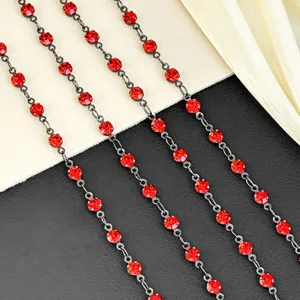 Detailed close-up of 4mm red rhinestone cup chains, sparkling crystal trim for DIY accessories.