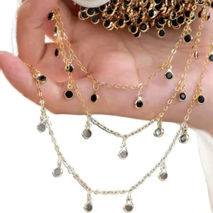 DIY gold metal chain with black beaded pendants, perfect for handmade bag and jewelry assembly.