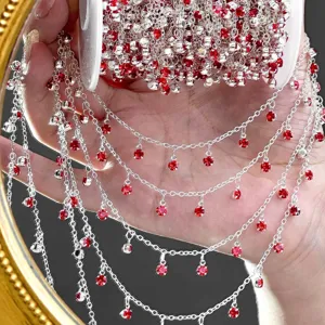 DIY silver metal chain with red rhinestone pendants for handmade jewelry crafting and apparel.