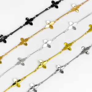 Detail shot of DIY metal chains with four-petal flower and straight bar design in multi-colors.