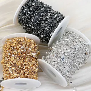 Detail shot of sparkly rhinestone sequin chain spools, perfect for DIY jewelry and crafts.