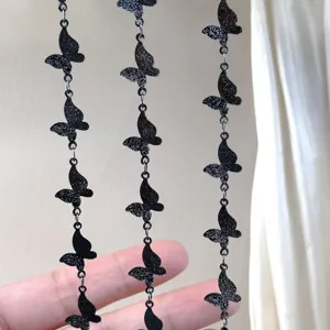 Black glitter butterfly chain DIY clothing material for gothic style and Halloween accessories.