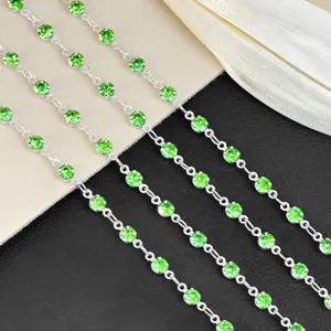 Detailed close-up of DIY 4mm green rhinestone silver cup chain for accessories decoration.
