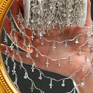 DIY silver chain with cross charms and rhinestones, perfect for handmade jewelry and bag decoration.