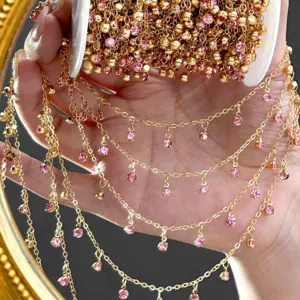 Gold DIY chain with sparkling pink rhinestones, perfect for handmade bracelets and necklaces.