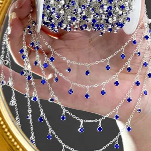 DIY silver rhinestone cup chain with sparkling blue crystals for jewelry making and crafts.