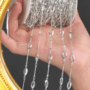 Detailed shot of silver marquise rhinestone chain DIY jewelry crafting material supply.