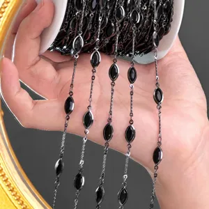 Close-up view of black marquise gemstone link chain roll, ideal for handmade diy craft.