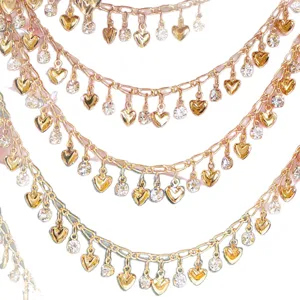 DIY gold chain with heart rhinestones and sparkly charms, perfect for handmade crafts and deco.