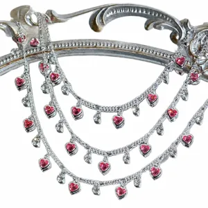 DIY silver chain with sparkling pink heart rhinestones for handmade crafts and costume decor.